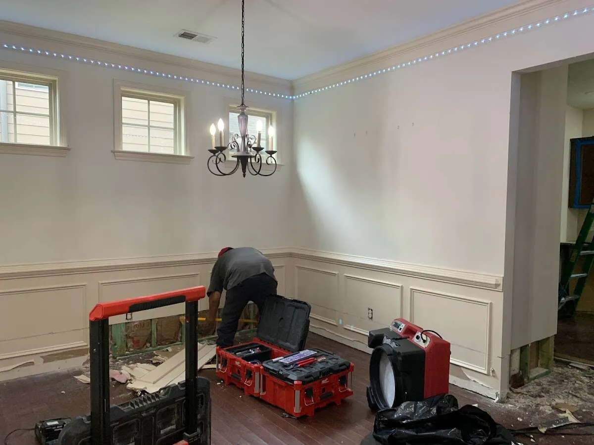 Restoration technician with professional equipment in Carmel